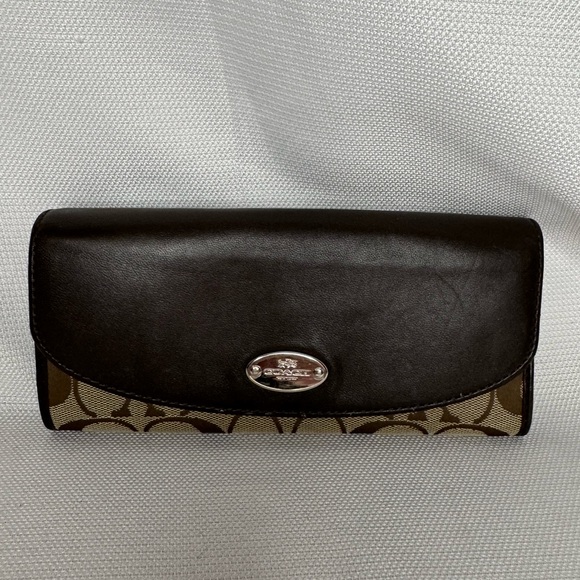 Coach Handbags - Coach Brown Leather Flap Wallet w/Jacquard Monogram GUC